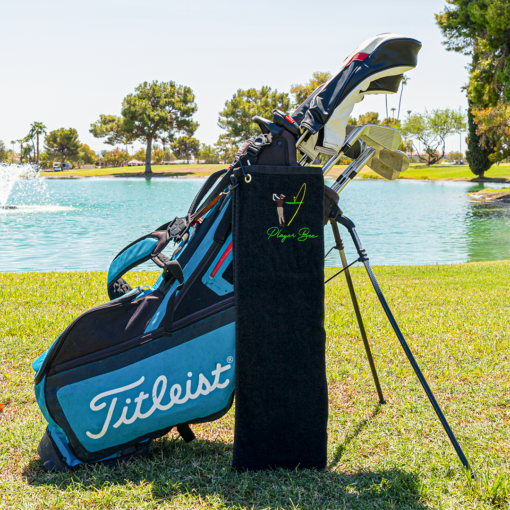 black golf towel on golf bag