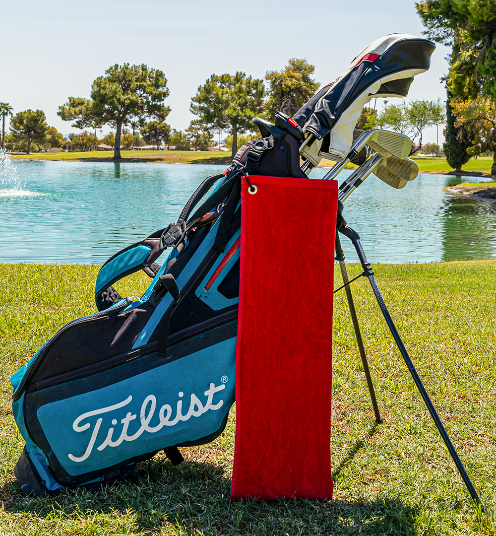 red golf towel with no logo on golf bag