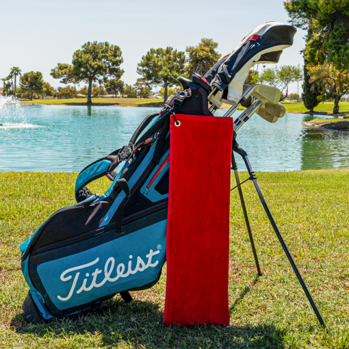 red golf towel with no logo on golf bag