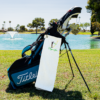 white golf towel with logo on golf bag